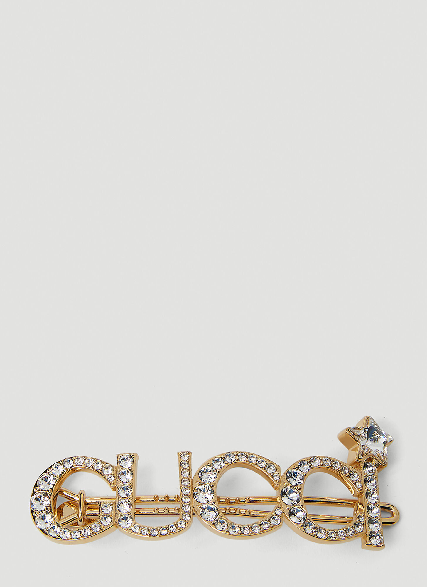 Gucci Embellished Logo Hair Slide In Gold