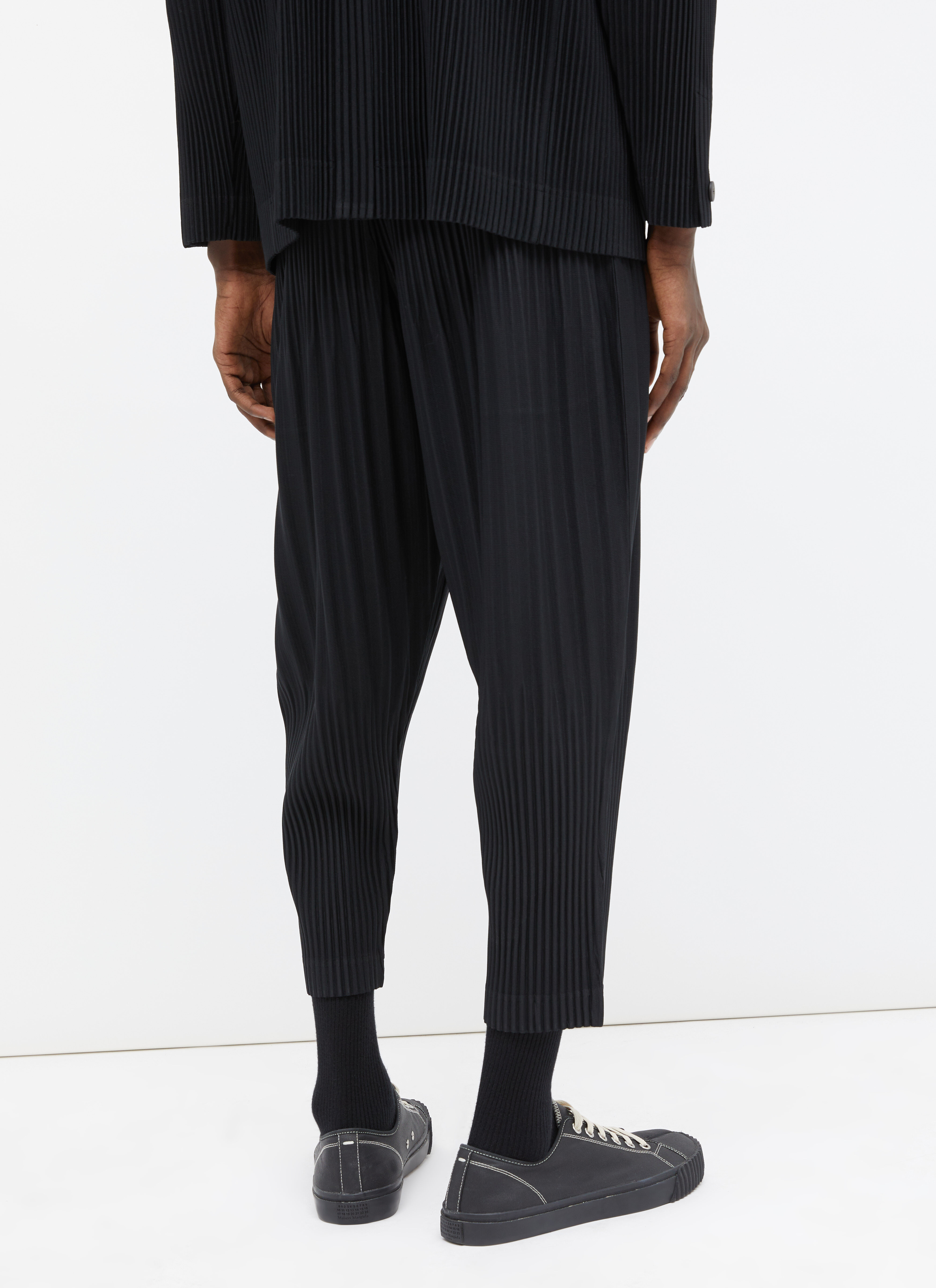 Homme Plissé Issey Miyake Tapered Pleated Pants in Black | LN-CC®
