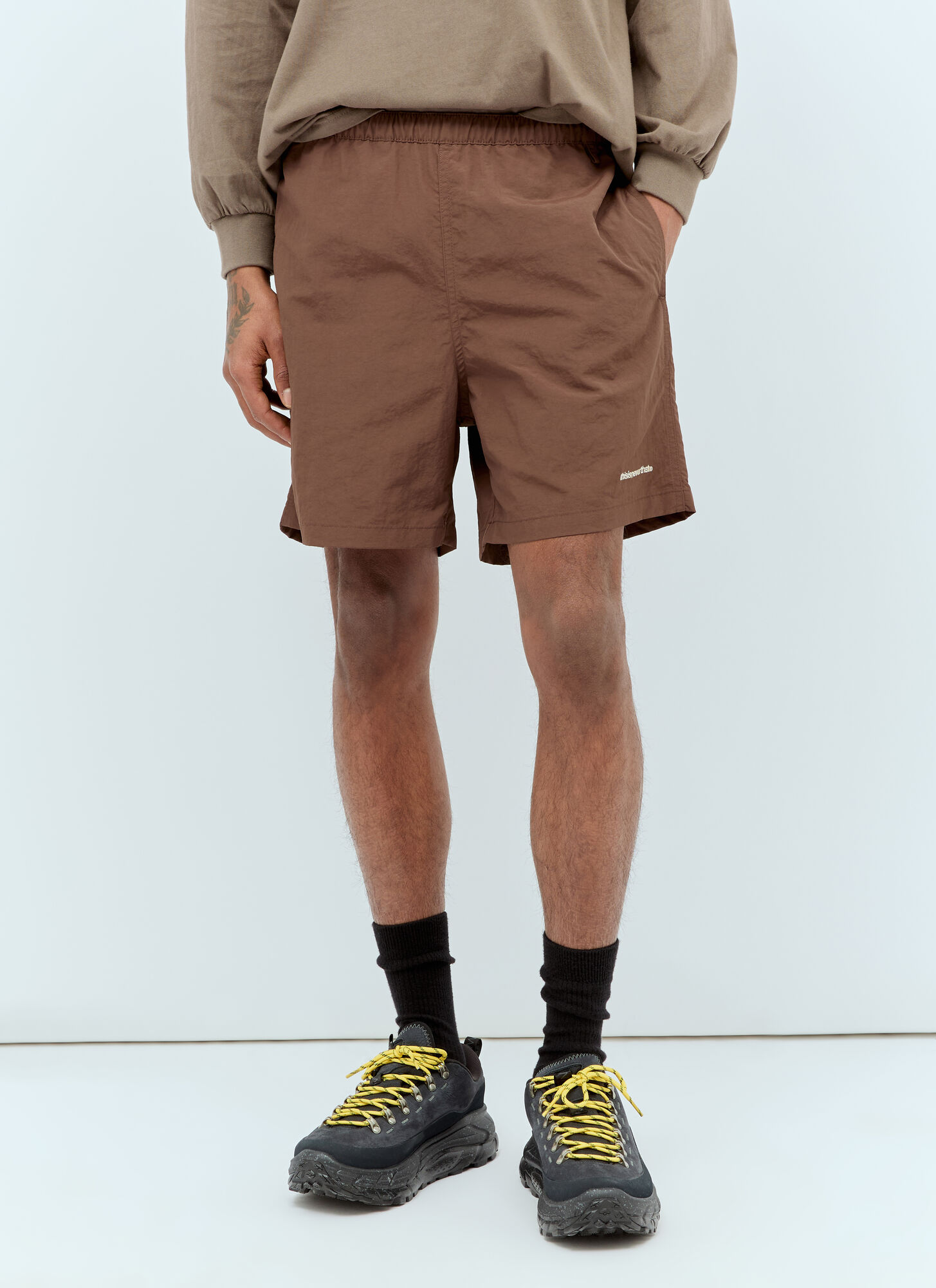 Shop Thisisneverthat Logo Embroidery Jogging Shorts In Brown