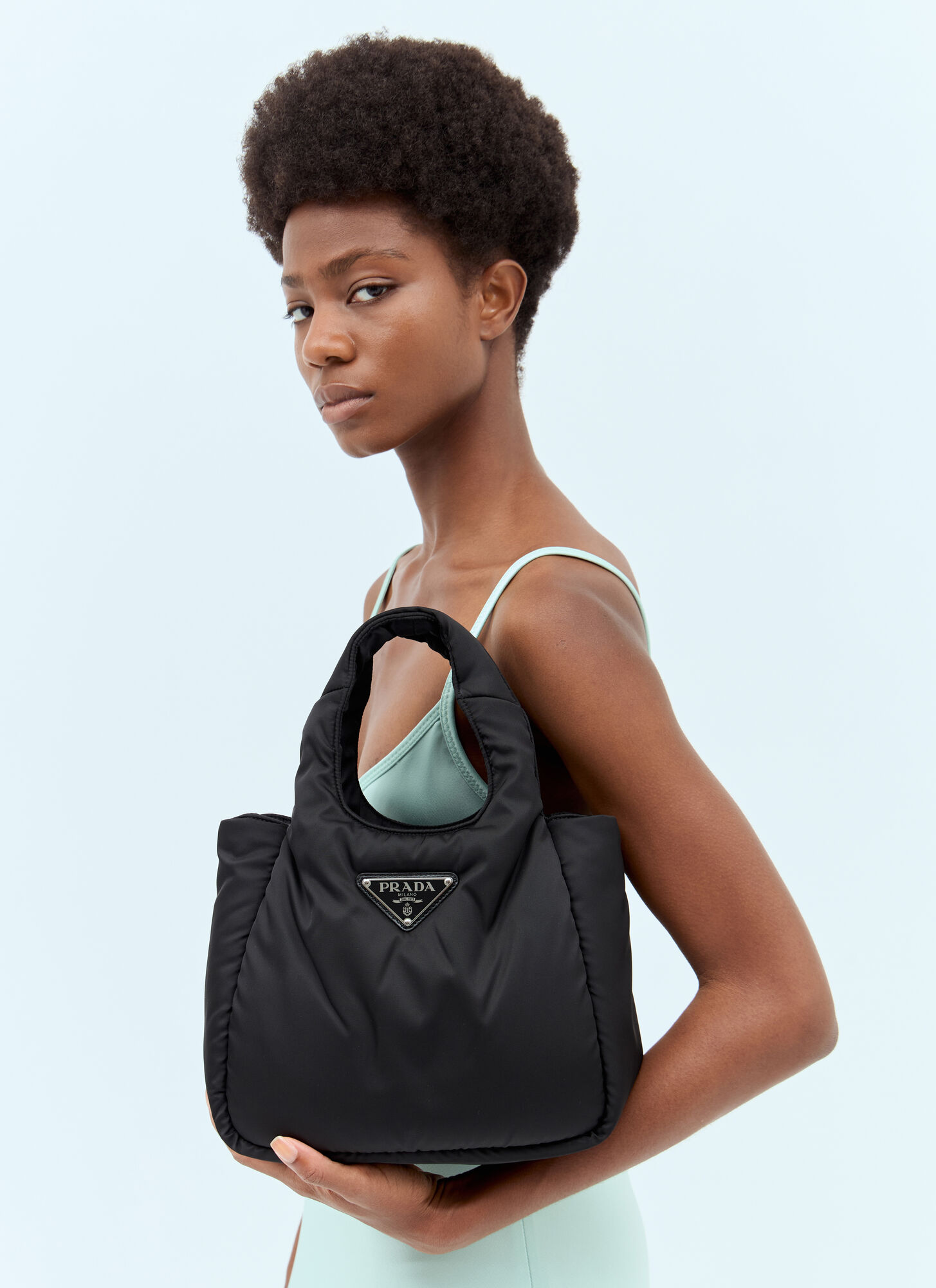 Prada Small Padded Re-nylon Handbag In Black