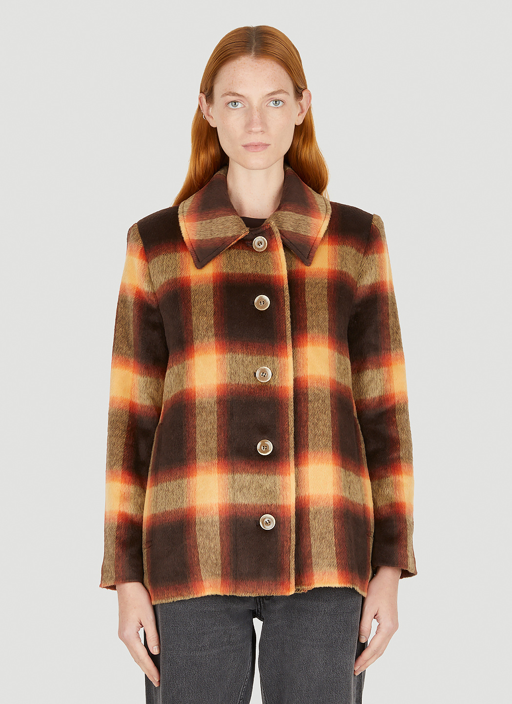 orange and brown plaid jacket