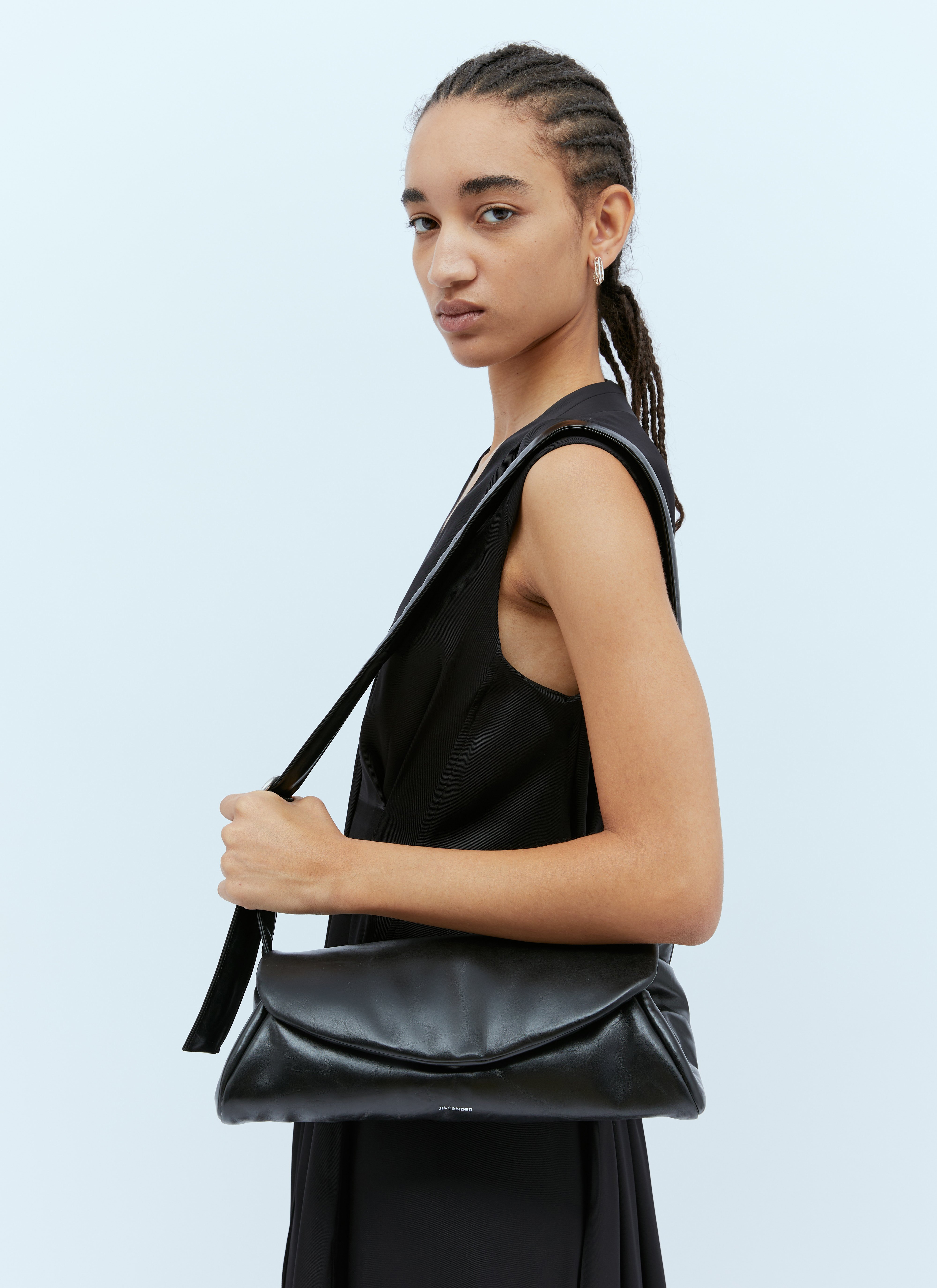 Jil Sander Cannolo Crossbody Bags in Black