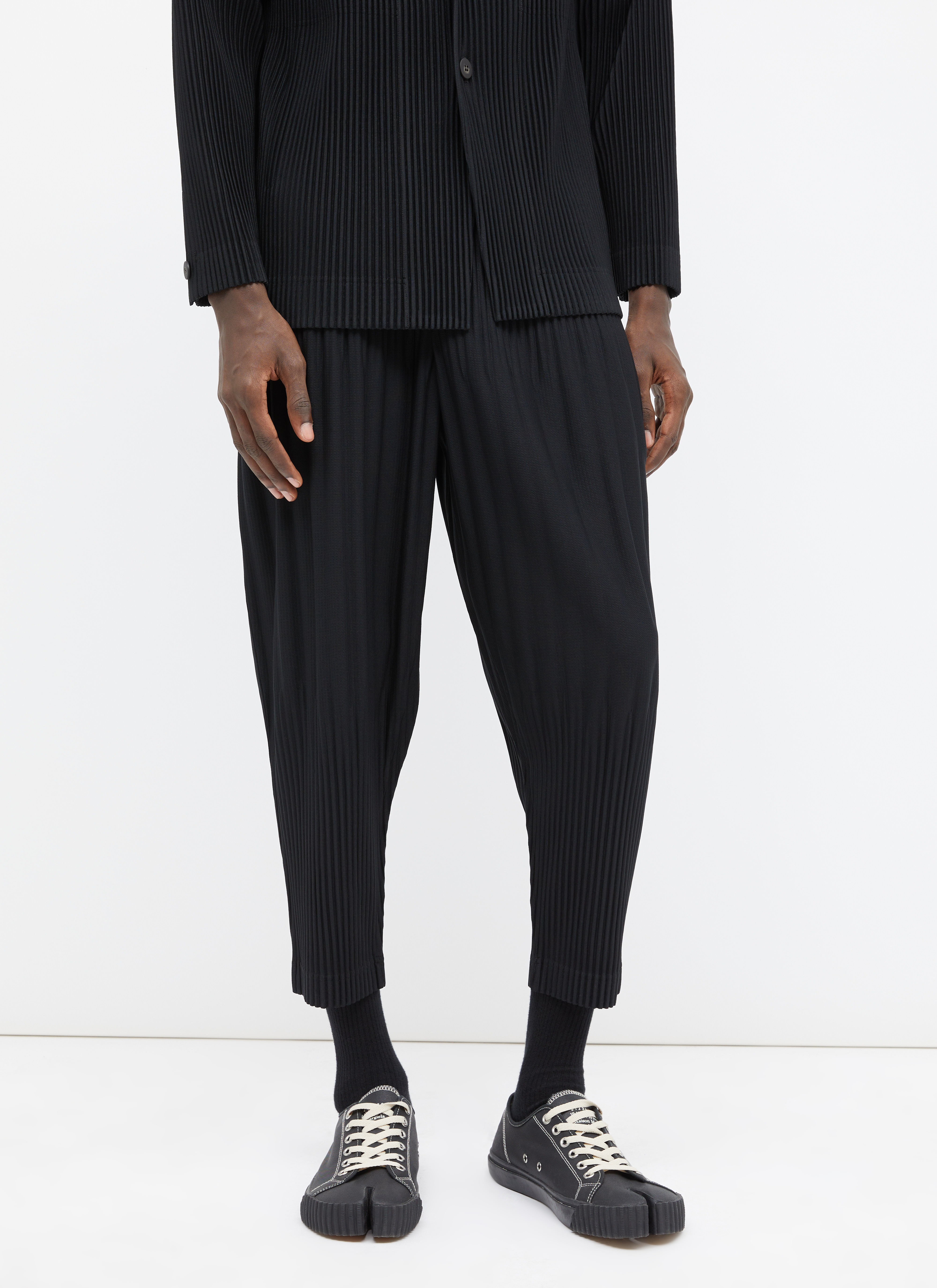 Homme Plissé Issey Miyake Men's Tapered Pleated Pants in Black